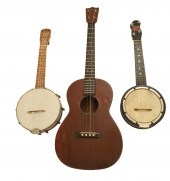 MARTIN UKULELE W/CASE AND 2 BA