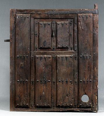 Massive iron mounted castle door,