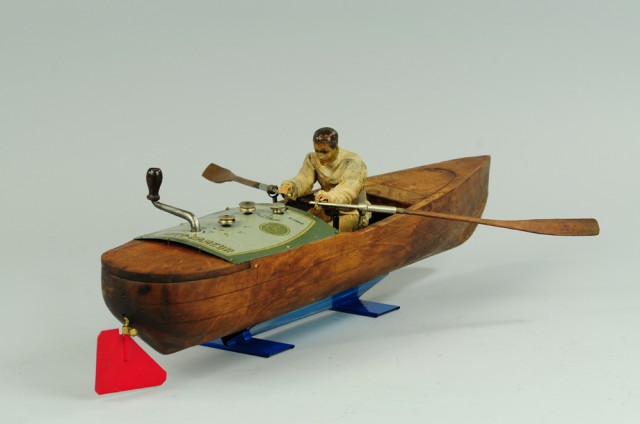 MECHANICAL ROWER IN WOOD BOAT