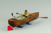 MECHANICAL ROWER IN WOOD BOAT