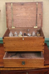 MEDICINE CHEST. Walnut with li