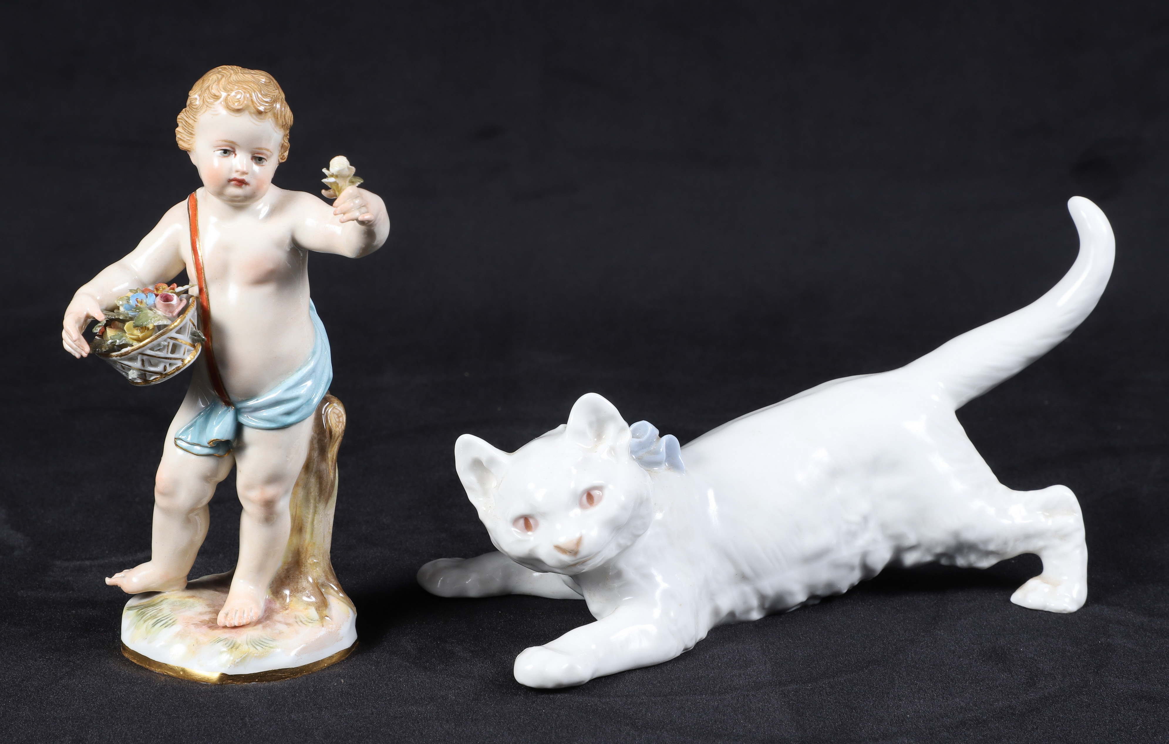 Meissen cherub and kitten with