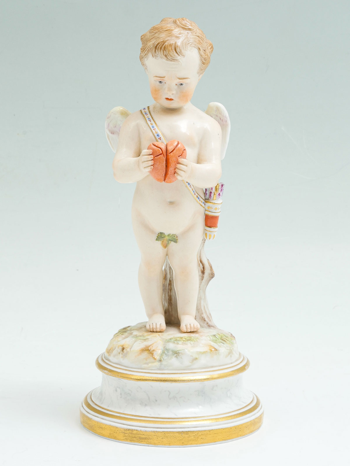 MEISSEN CHERUB WITH BROKEN HEART: