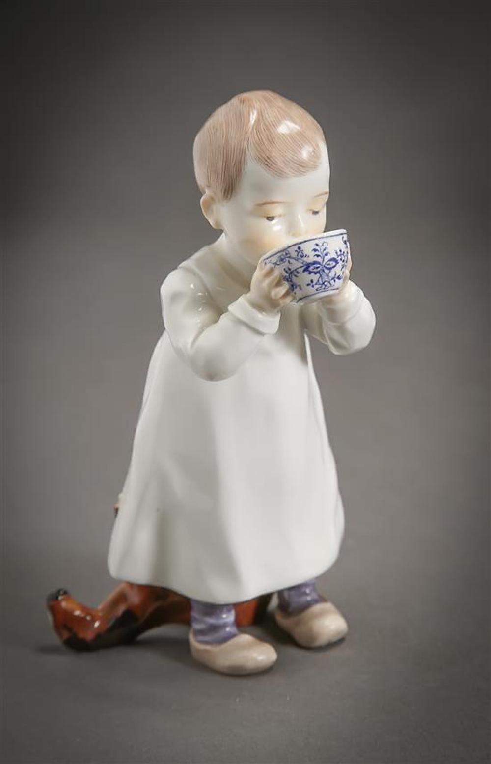 MEISSEN FIGURE OF A BOY DRINKING