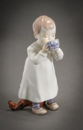 MEISSEN FIGURE OF A BOY DRINKI