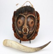 MELANESIAN TRIBAL MASK AND AN