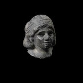 MESOPOTAMIAN HEAD OF A FEMALE