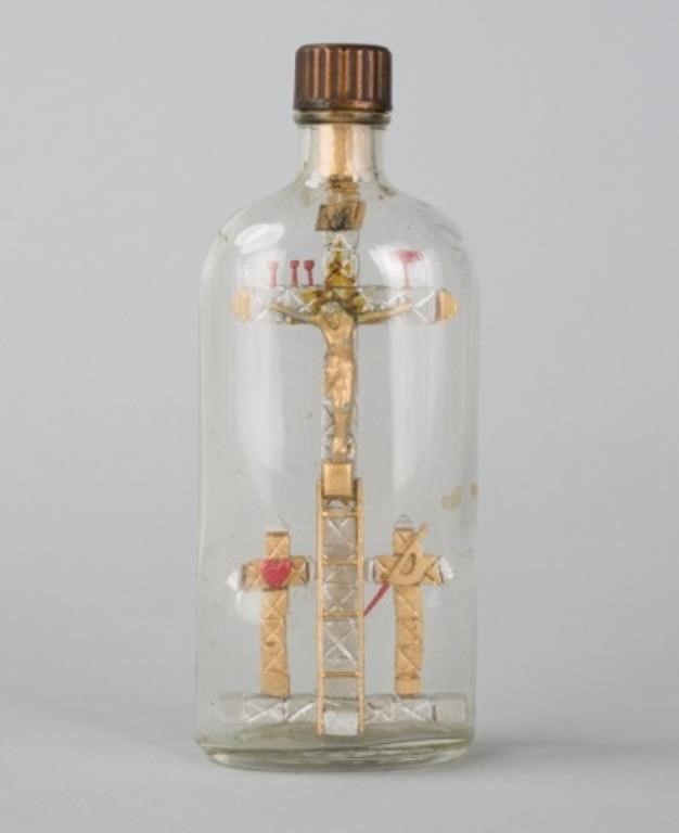 METAL CORPUS IN BOTTLEA crucifixion