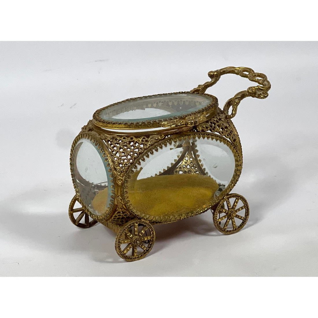 Metal jewelry casket coach. Gilt