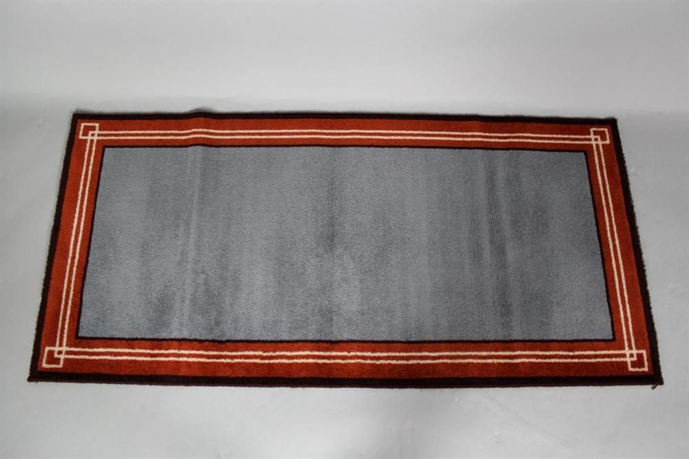METAL LOG RACK AND A RUG the