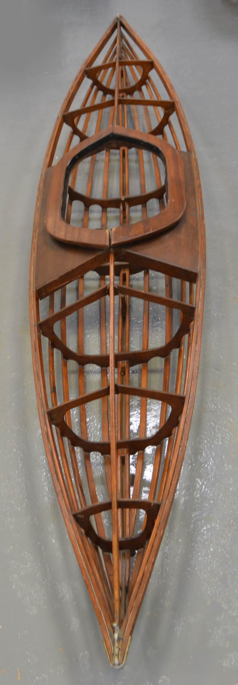 METAL MOUNTED TEAK KAYAK FRAMEMETAL