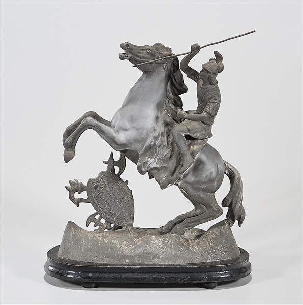 Metal sculpture of a man with