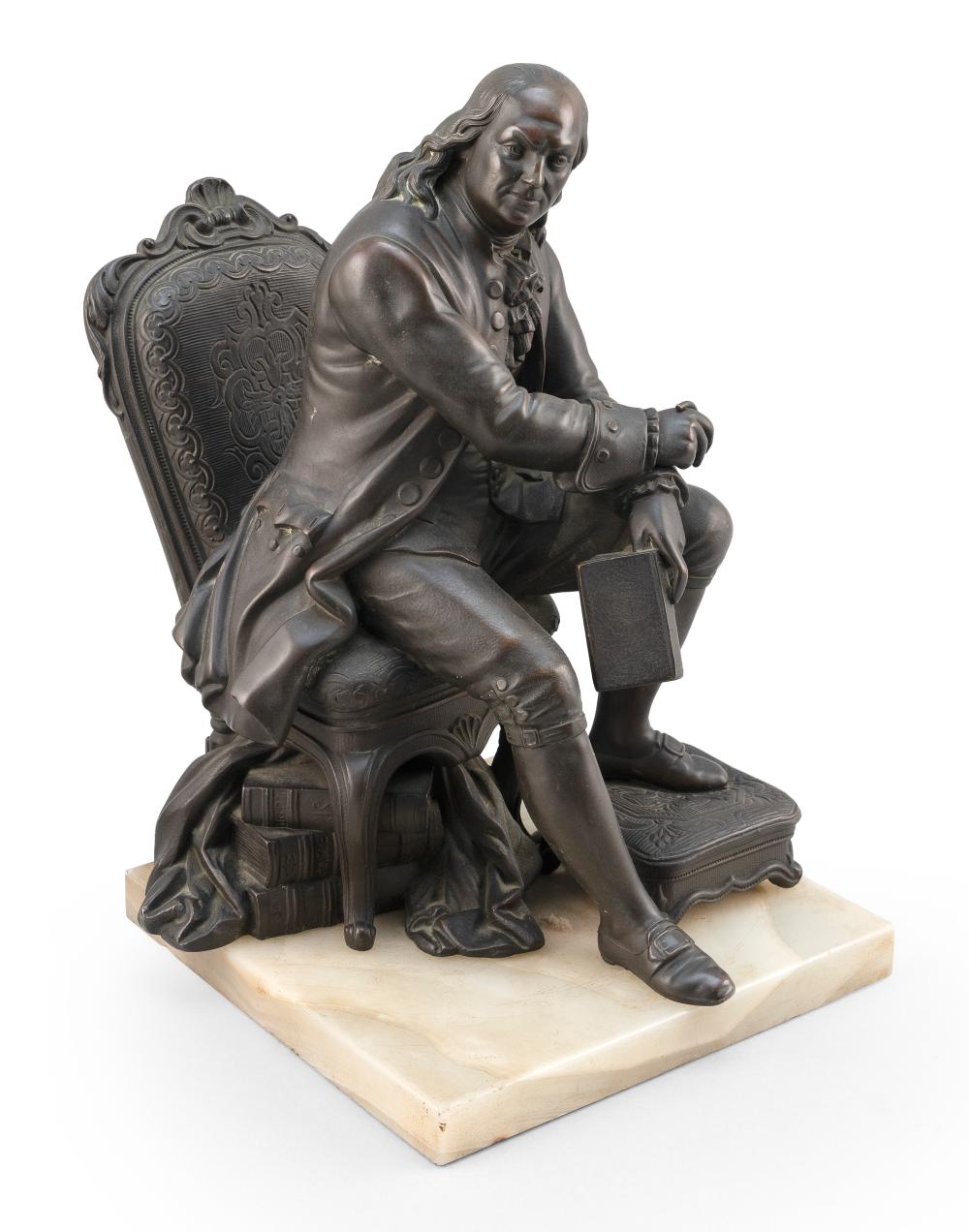 METAL SCULPTURE OF A SEATED