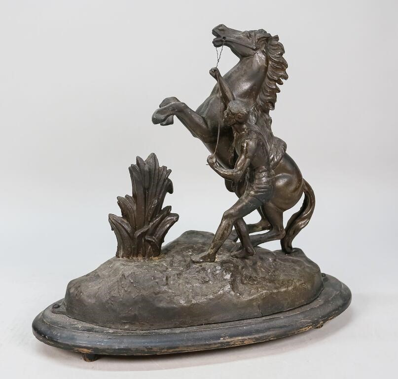 METAL STATUE OF HORSE WITH MAN ON