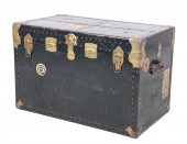 Metal strapped travel trunk, b