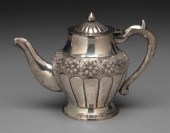 Mexican silver teapot, scroll