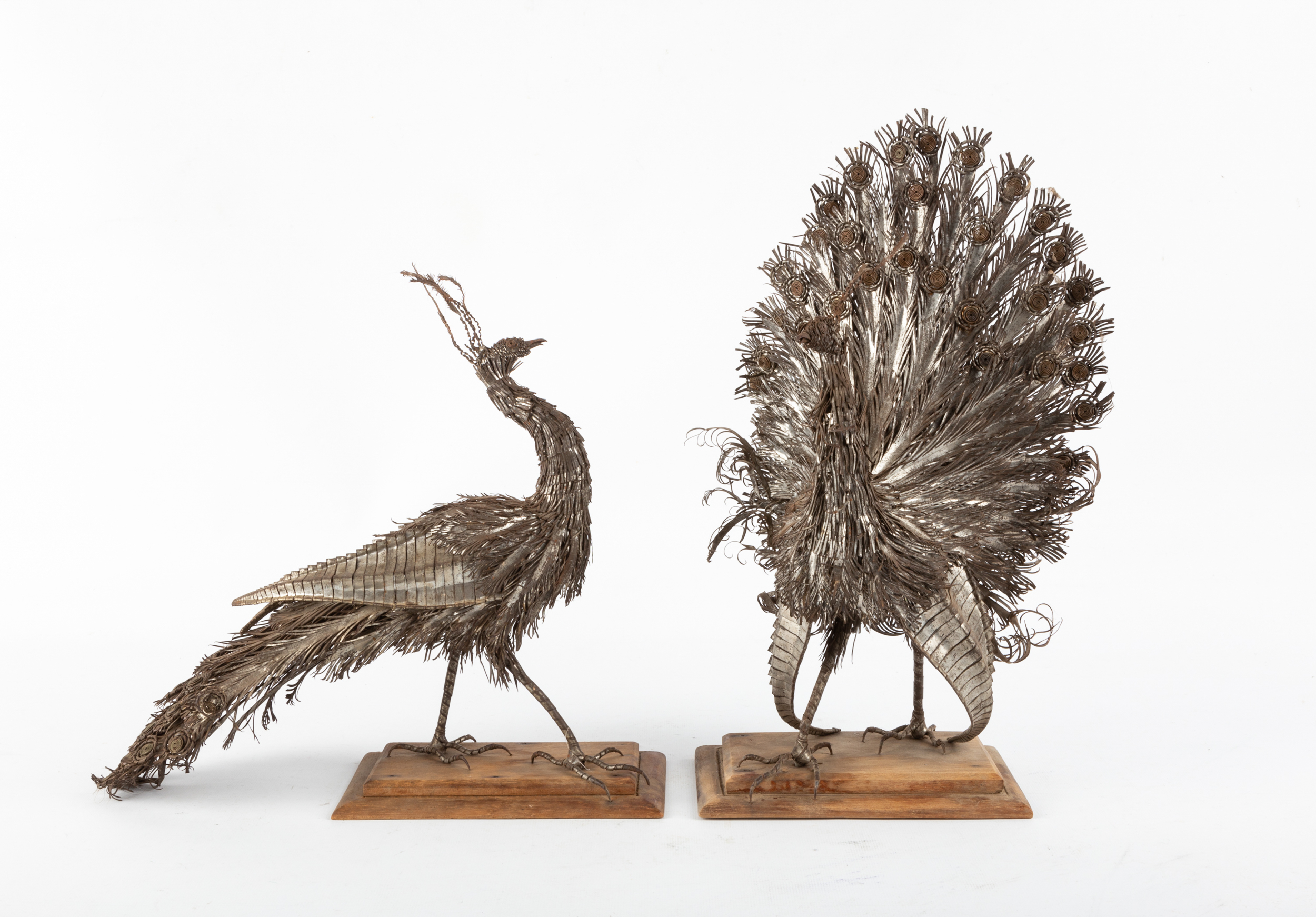 MEXICAN SILVERED METAL PEACOCKS