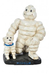 MICHELIN MAN WITH DOG SCULPTUR