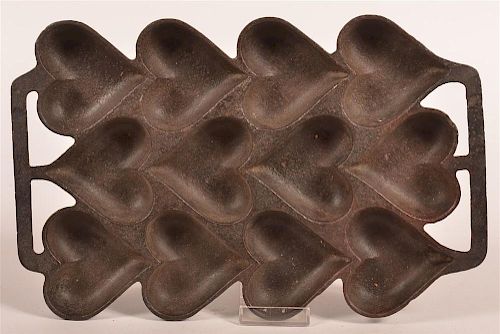 MID 19TH C. FOLD ART HEART FORM