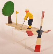 MID 20TH CENTURY GOLFER WHIRLY