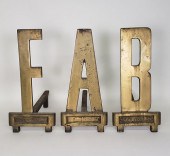 MID-CENTURY MODERN BRASS "FAB"