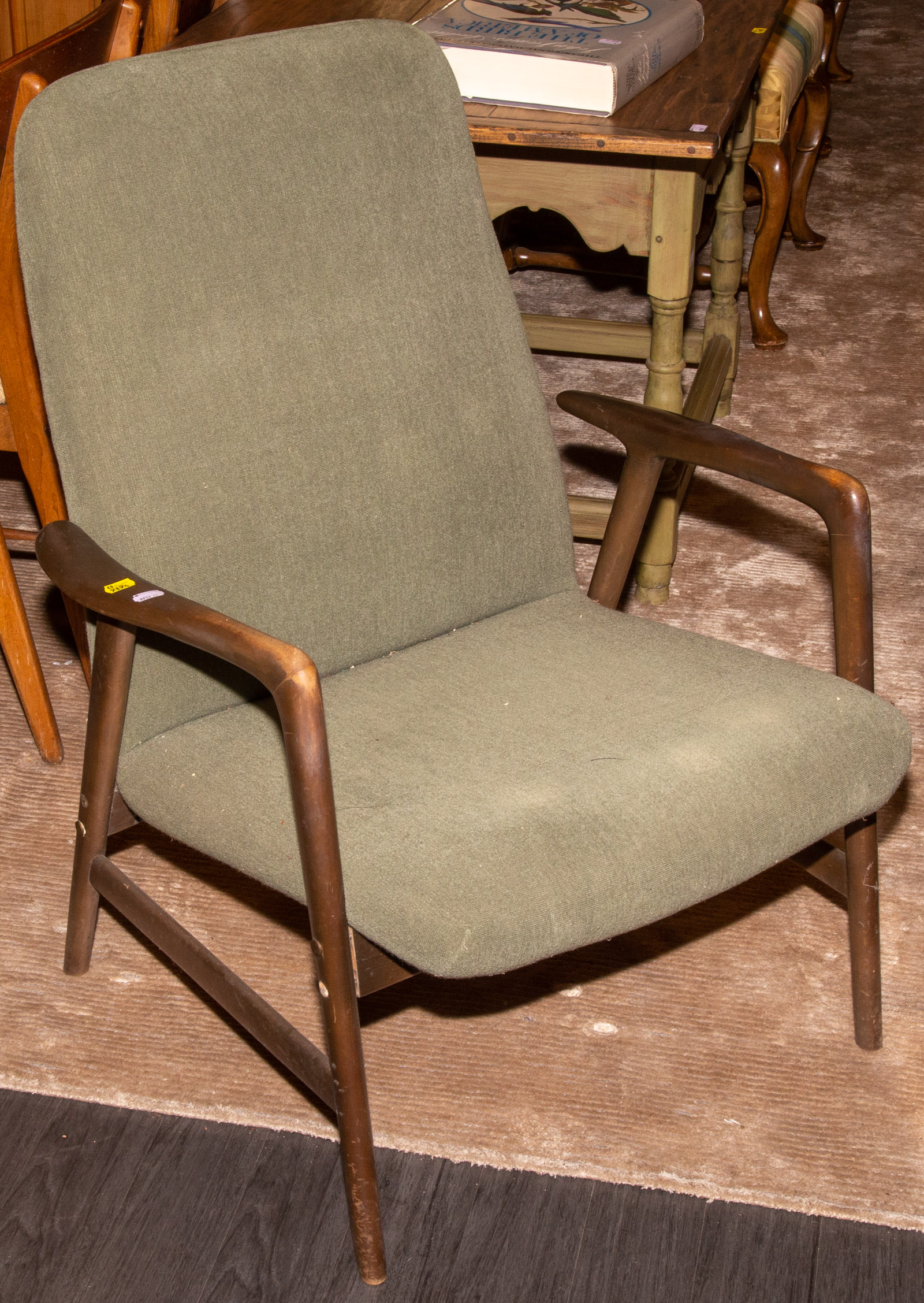 MID-CENTURY STYLE ARM CHAIR .