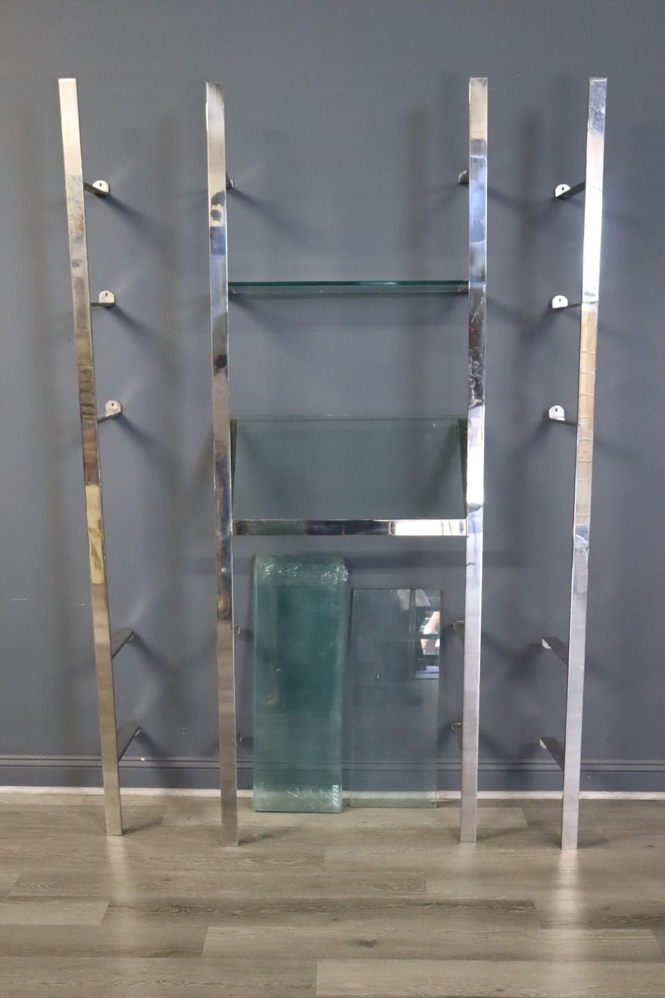MIDCENTURY CHROME WALL UNIT.