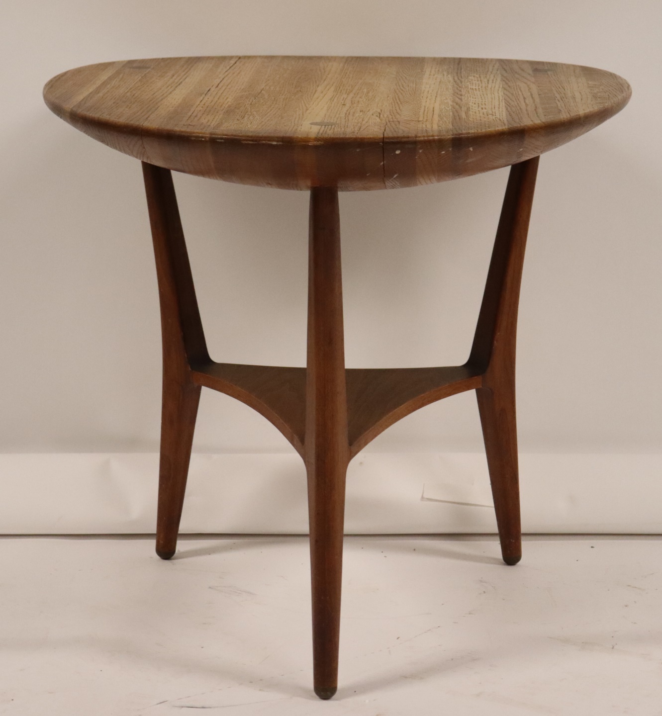 MIDCENTURY TEAK DISH TOP TABLE.