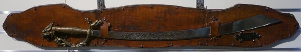MIDDLE EASTERN SWORD ON LEATHER