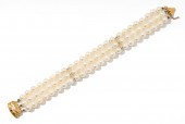 MIKIMOTO 18 KARAT YELLOW GOLD
