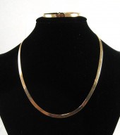 MILROS FOURTEEN KARAT GOLD CHA
