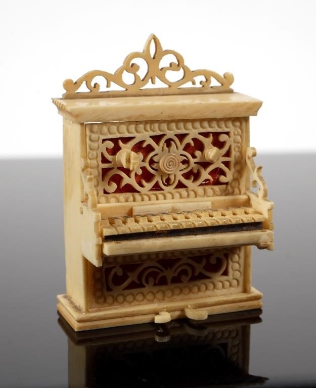 MINIATURE CARVED IVORY UPRIGHT
