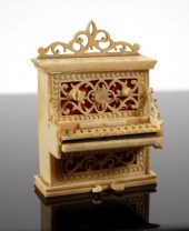 MINIATURE CARVED IVORY UPRIGHT