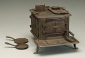 Miniature cast iron stove, "Li