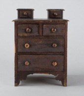 MINIATURE CHEST IN OLD BROWN P