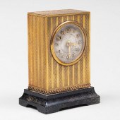 MINIATURE GILT TABLE CLOCKIn a