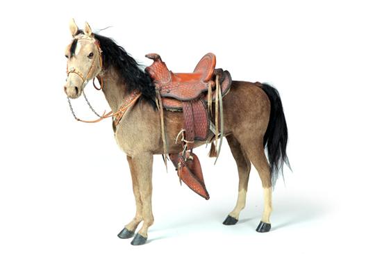 MINIATURE HORSE WITH SADDLE. 