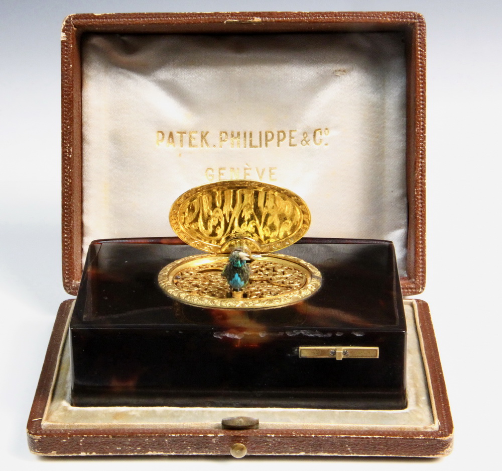 MINIATURE MECHANICAL MUSIC BOX -
