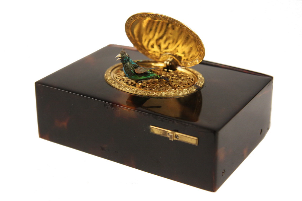 MINIATURE MECHANICAL MUSIC BOX -