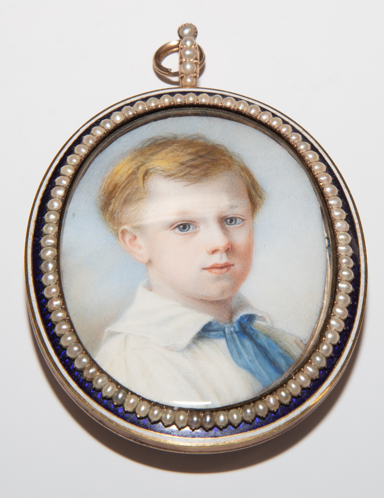 MINIATURE PORTRAIT OF YOUNG BOY .