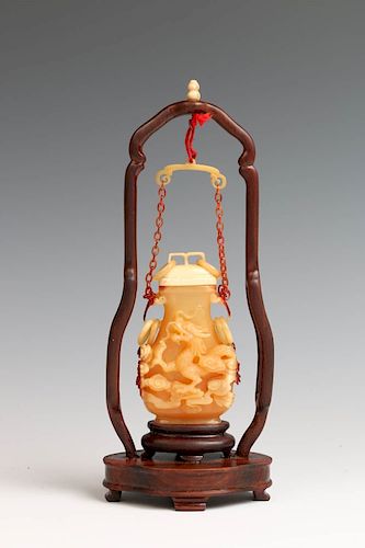 MINIATURE RED ARSENIC CARVED VASE