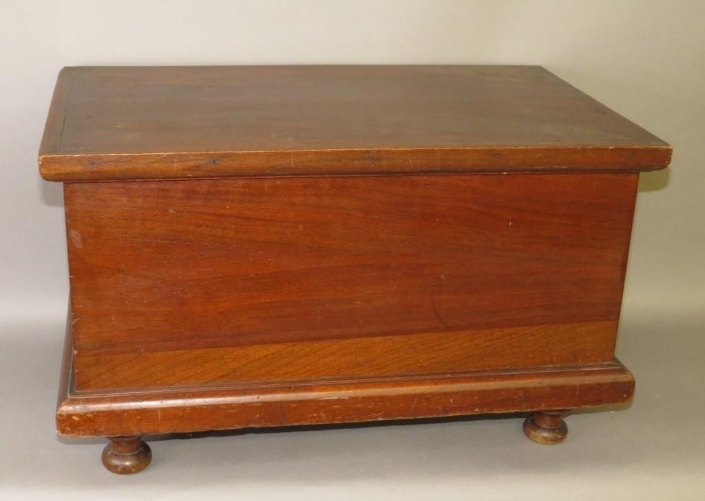 MINIATURE WALNUT CHEST ON TURNED