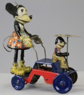 MINNIE MOUSE PUSHING BABY FELI
