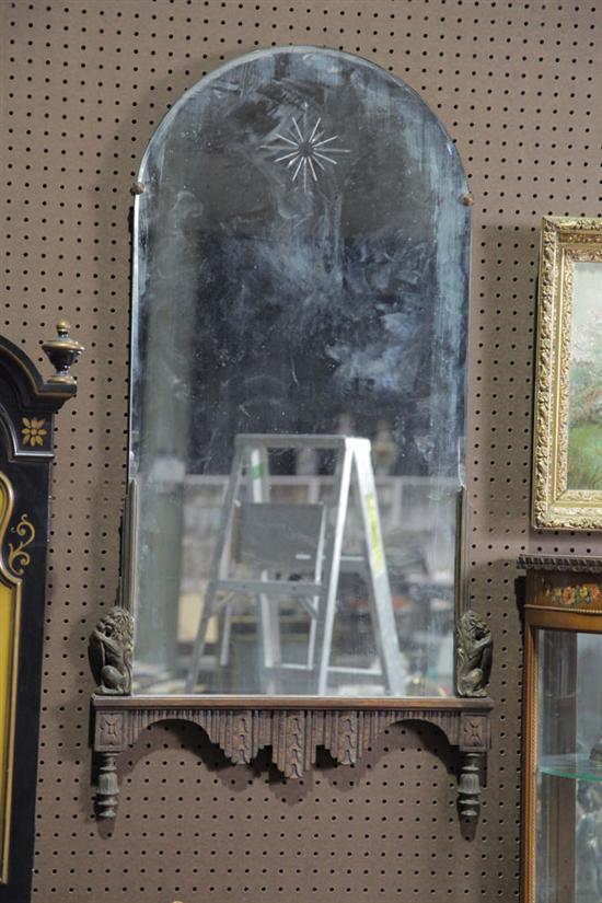 MIRROR. Arched top having cut