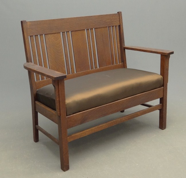 Mission oak settee. 46'' W.
