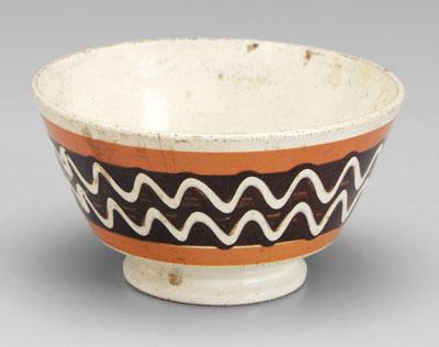 Mocha ware bowl, wavy white slip
