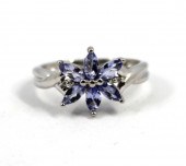 MODERN 10K WHITE GOLD AND TANZ