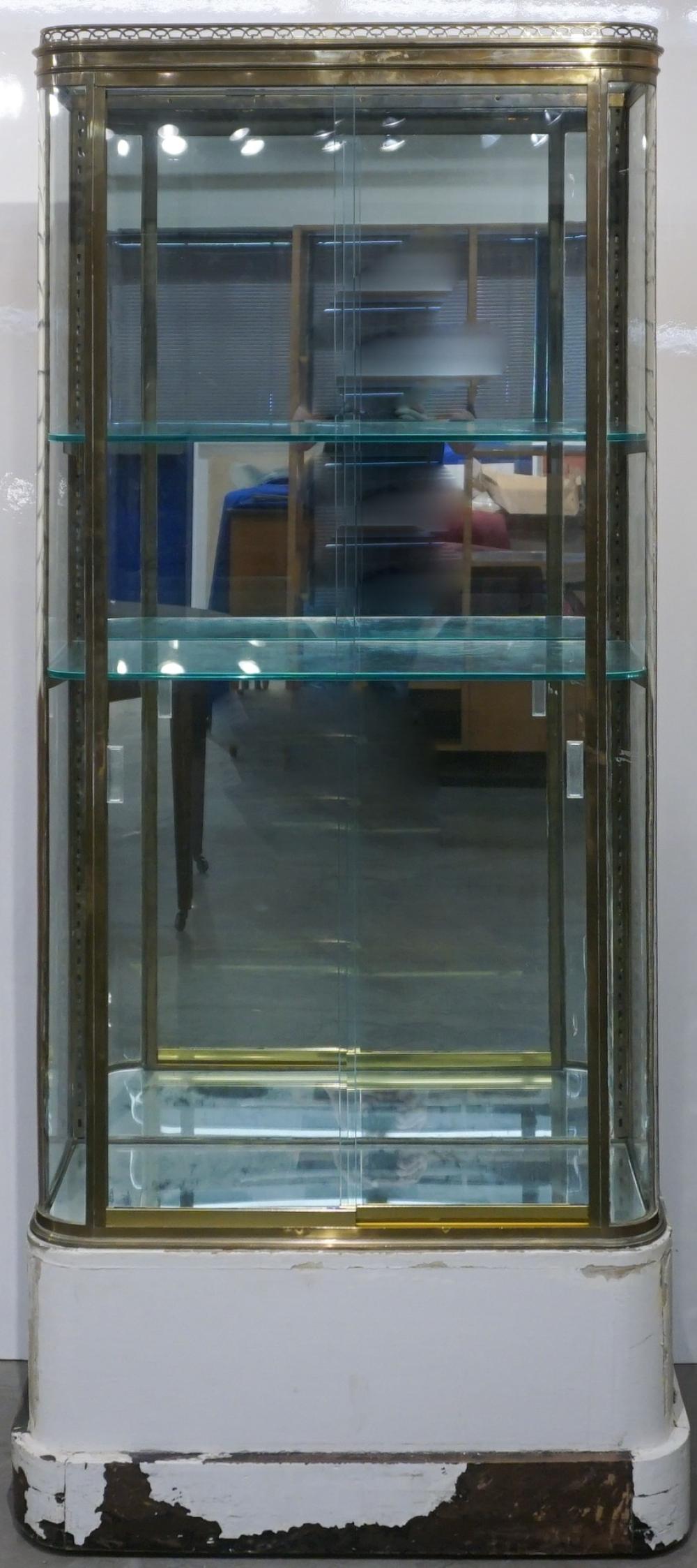 MODERN BRASS AND GLASS SLIDING DOOR