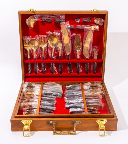 MODERN GILT METAL FLATWARE SERVICE,