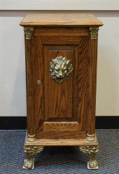 MODERN OAK AND CAST BRASS MOUN